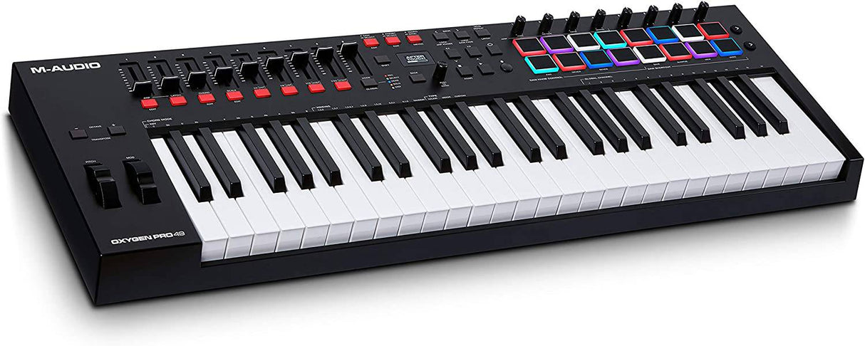 M-Audio Oxygen Pro 49 - Controlador de teclado MIDI USB de 49 teclas con Beat Pads, perillas asignables MIDI, botones y faders y paquete de software incluido