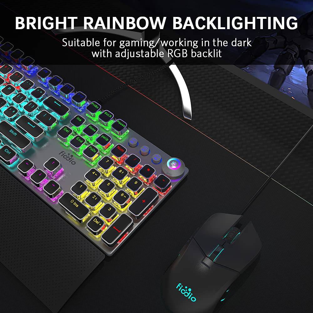 Fiodio - Teclado mecánico para juegos, retroiluminación LED Rainbow Gaming, 104 teclas anti-efecto fantasma, interruptores negros de respuesta rápida, control multimedia para PC y computadora de escritorio, con reposamanos extraíble