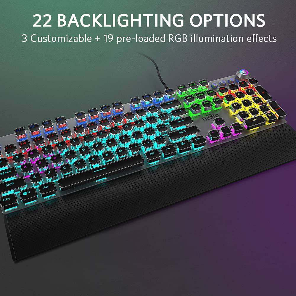 Fiodio - Teclado mecánico para juegos, retroiluminación LED Rainbow Gaming, 104 teclas anti-efecto fantasma, interruptores negros de respuesta rápida, control multimedia para PC y computadora de escritorio, con reposamanos extraíble