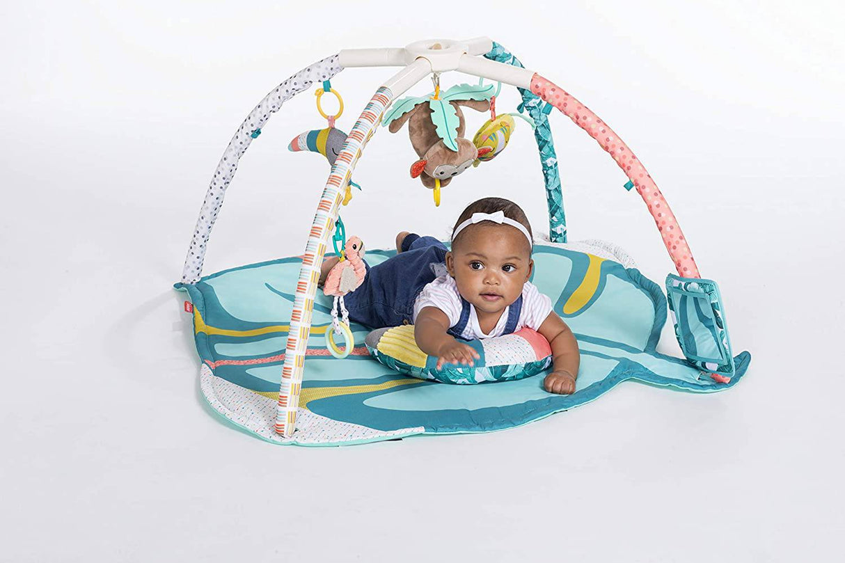 Infantino 4 en 1 Deluxe Twist & Fold Activity Gym & Play Mat, Tropical - Incluye juguetes enlazables, mono musical, espejo y almohada de refuerzo, para recién nacidos, bebés y niños pequeños - DIGVICE MX
